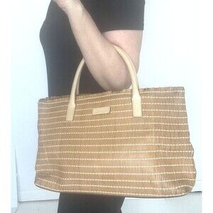 Vintage Calvin Klein Collection LEATHER fringe woven bag. Super cute for summer!